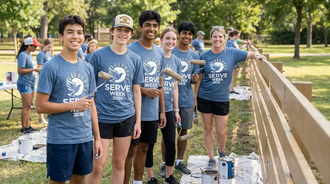 Teen volunteers and a leader on a community service day, wearing matching mission-trip shirts
